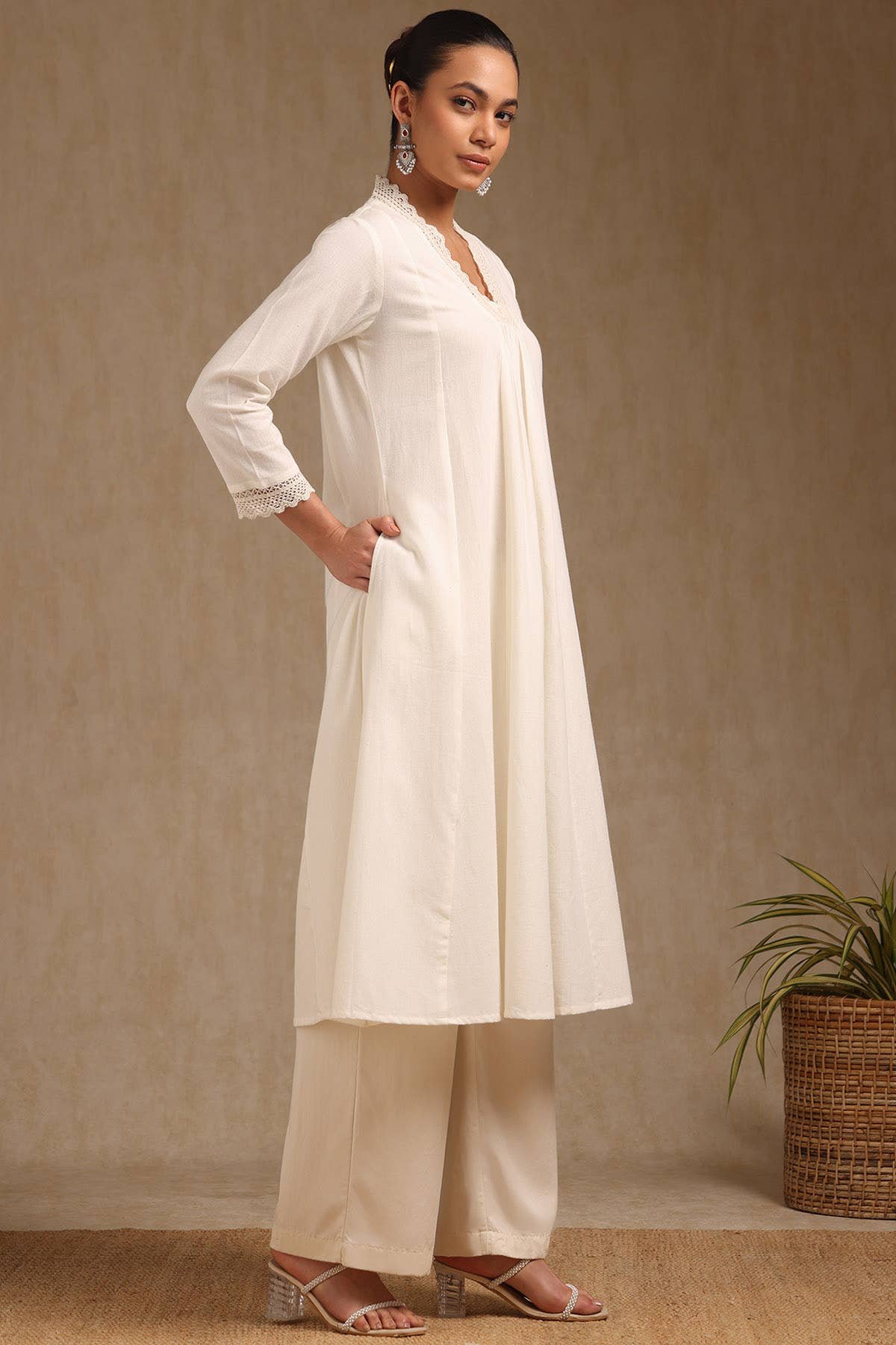 Off White Cotton Solid V-Neck Lace Inserts A-Line Kurta With Front Pleats - View 3